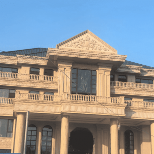 金华黄金麻别墅外墙干挂石材效果示例