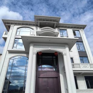 金华白麻别墅外墙干挂石材效果示例