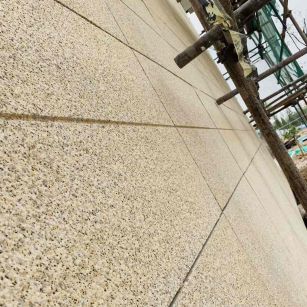 金华 黄金麻花岗岩荔枝面外墙干挂石材效果示例