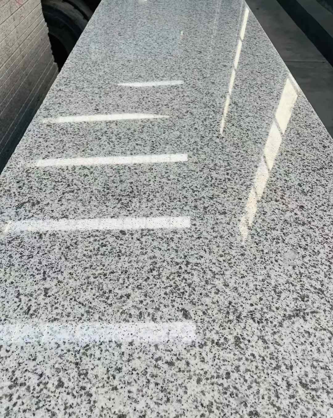 金华 白麻花岗岩光面毛板